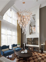 Chandelier en cristal moderne aux inspirations florales et élégantes pour un foyer sophistiqué.-LUMICONCEPT