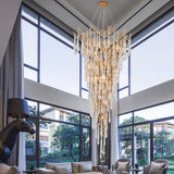 Chandelier en cristal moderne aux inspirations florales et élégantes pour un foyer sophistiqué.-LUMICONCEPT