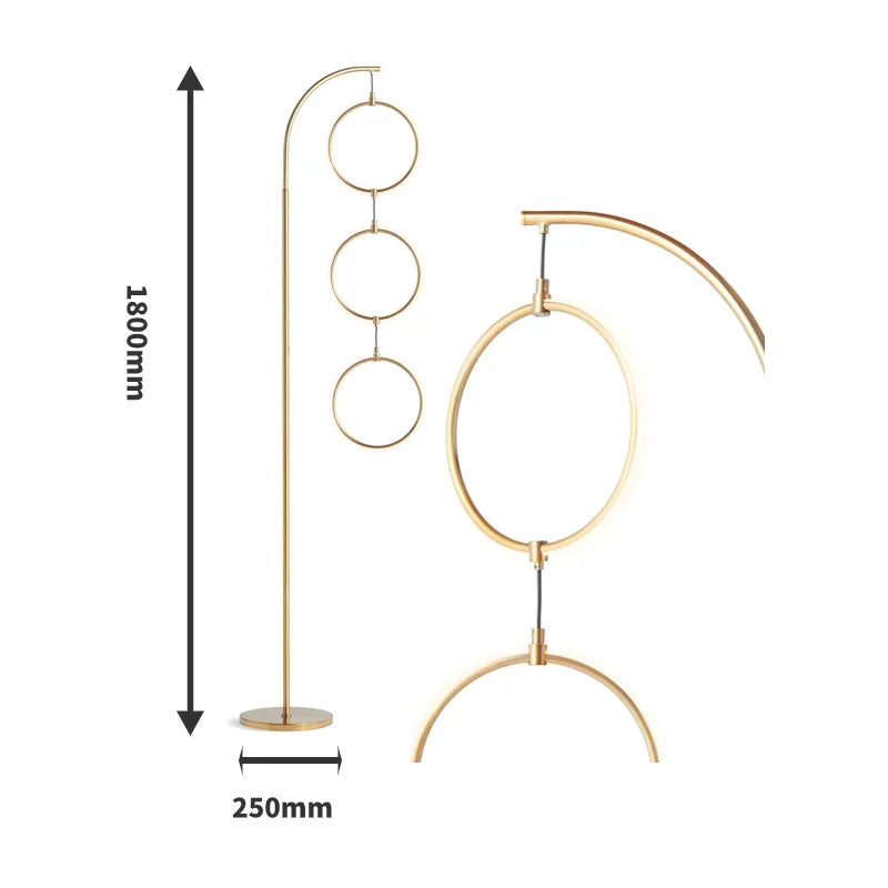 Lampadaire moderne en métal doré avec 3 cercles suspendus pour un éclairage élégant dans votre salon-LUMICONCEPT