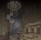 Lustre en cristal suspendu pour un hall moderne, illuminant avec élégance votre escalier et espace de vie.-LUMICONCEPT