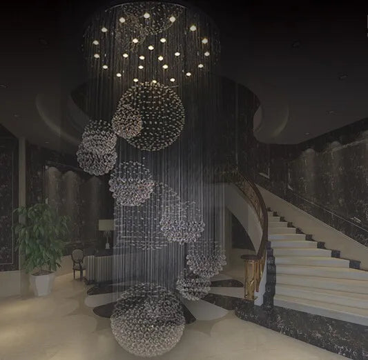 Lustre en cristal suspendu pour un hall moderne, illuminant avec élégance votre escalier et espace de vie.-LUMICONCEPT