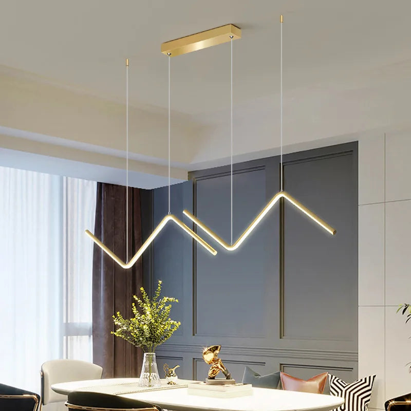 Lange LED-Pendelleuchte DARHYNA – Moderne Eleganz in Gold und Schwarz