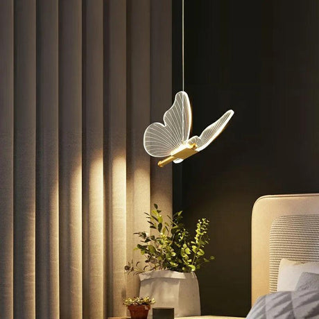 Suspendu Design : Suspension Lumineuse en Forme d'Oiseau avec Ailes en Verre-LUMICONCEPT